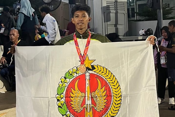 🥈 Kilauan Perak dari Lintasan POPNAS 2025: Mas Raditiya Putu Tama Ukir Prestasi di Cabor Atletik